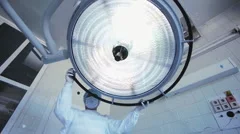 Doctor on Medical operating lights