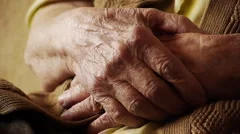 Senior old woman hand wrinkle skin close up