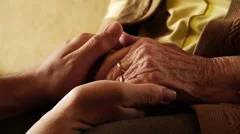 Senior old woman young man hold hand wrinkle skin close up  