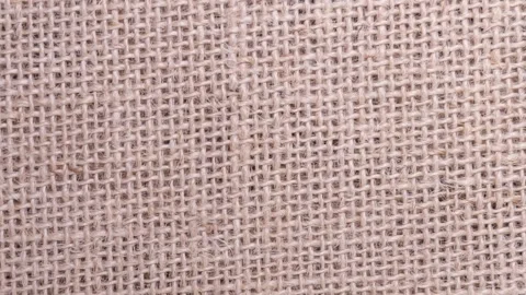 001_Close up of rough burlap fabric texture.mp4 Stock Footage 345539808