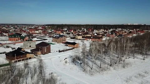 002 Helicopter. Air. Clouds Sky. Forest. Field. Winter. Snow. Tree. Houses Stock Footage 105089125