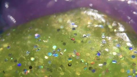 002_Close up of glitter slime texture.mp4 Stock Footage 342270114