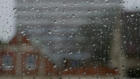 003-Timelapse-Glass Window Raindrops in English Town Stock Footage 170197592