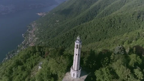 0039 lighthouse lakecomo Como lake- mountain trees wood Stock Footage 85275121