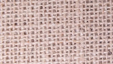 003_Close up of burlap fabric texture.mp4 Stock Footage 345539805