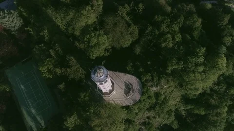 0048 lighthouse lakecomo Como lake mountain trees wood Stock Footage 85274909
