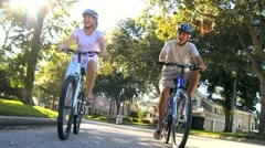 Retirement Cycling Exercise by Healthy Senior Couple