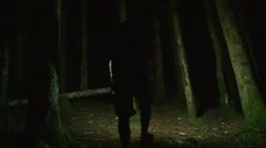 Man Walking in Dark Scary Forest