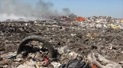 Burning garbage dump, pollution