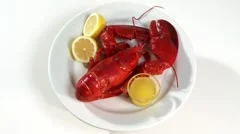 Cooked lobster with butter sauce and lemon