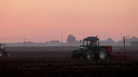 0086 Two tractors at work in a farm land Video stock 30873666