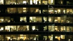 Windows in business city: people at work