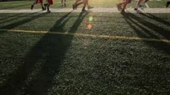 Football Players Running Shadows