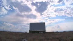 A screen under a big sky at an abandoned drive in theater.