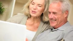 Senior Couple Using Online Webchat Communication