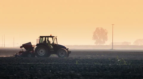 0091 Tractor at work in a farm land Stock Footage 30870457
