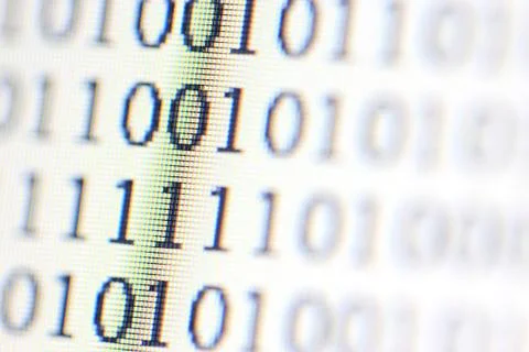 0,1, binary code on led computer monitor Stock Photos