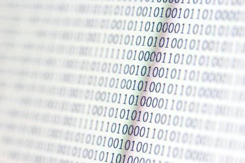 0,1, binary code on led computer monitor 写真素材