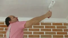 House Painter using paint roller