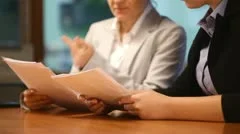 Business women working with documents in office