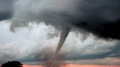 Huge tornado ravages the landscape, spreading disaster and destruction