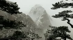 Snow falling Yellow mountains, China