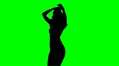 Silhouette girl dancing green screen