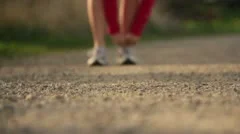 Runner Running on a gravel road exercising working out