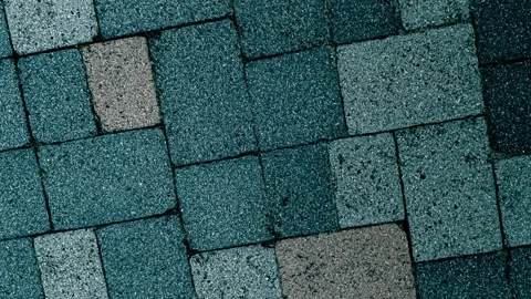010_Textured asphalt roofing shingles pattern.mp4 Stock Footage 345657076