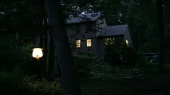 A Haunted House in the Woods at Night