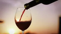 Red Wine Pouring on Sunset