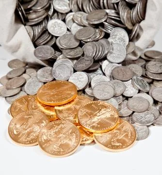 linen bag of old pure silver coins used to invest in silver as a commodity with a selection of golden eagle gold coins xkwx bag,bank,bullion,carat,cash,cent,cloth,coin,coins,commodity,currency,dimes,dollar,eagle,finance,fortune,gold,golden,hoard,investment,isolated,jackpot,many,metal,money,old,pile,pot,price,pure,retirement,rich,sack,savings,silver,spill,sterling,studio,treasure,valuable,vintage,wealth,white