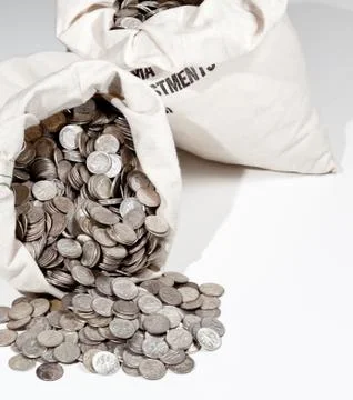 linen bag of old pure silver coins used to invest in silver as a commodity xkwx bag,bank,bullion,cash,cent,cloth,coin,coins,commodity,currency,dimes,dollar,finance,fortune,gold,hoard,investment,isolated,jackpot,many,metal,money,old,pile,pot,price,retirement,rich,sack,savings,silver,spill,sterling,studio,treasure,valuable,vintage,wealth,white