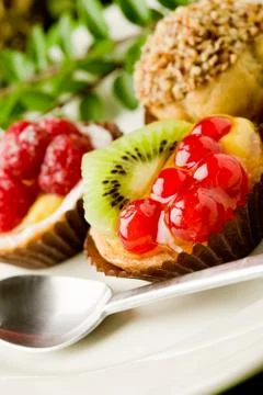photo  of  delicious  dessert  plate  with  italian  fruits  pastries xkwx cakes,  pastry,  cake,  candy,  dessert,  black  currant,  kiwi,  raspberries,  cream  puffs,  stuffed,  sugar,  cannoli,  chocolate,  candies,  catering,  spoon,  kitchen,  fruit,  italian,  italian,  tasty,  gourmet,  pies,  cream,  candle,  leaves,  decoration,  fire,  table,  food,  restaurant