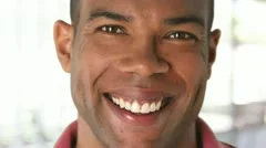 Closeup portrait of smiling African American man's face
