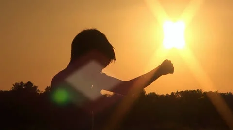 012 Engaging in the Thai boxing at sunset Stockbeeldmateriaal 25144336