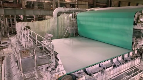 012 A machine for producing white paper. Shafts with paper pulp Video stock 301462298