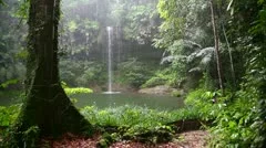 Waterfall at borneo rainforest in rainy day