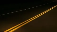 Night drive with yellow lines. Timelapse.