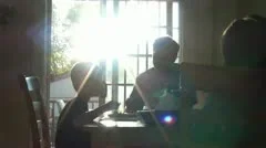 Family Eating Dinner in Sunshine