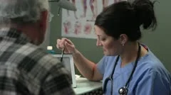 Doctor going over x-ray results with patient