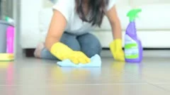 Woman cleaning the floor