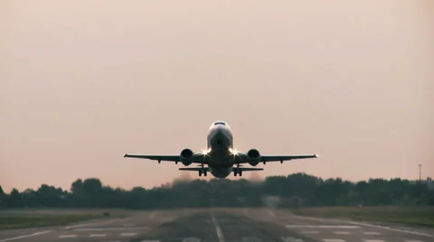 0167 Jet plane take off at dusk Stock Footage