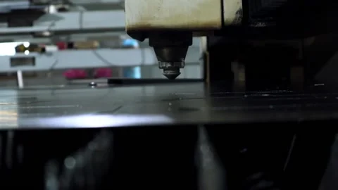 017 cutting sheet metal on a laser cnc machine Stock Footage 155306142