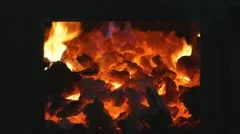 Burning coals in a stove
