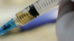 Blood and drugs in  injection syringe