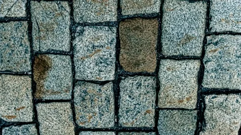 018_Granite cobblestone texture pattern close up.mp4 Stock Footage 345657012