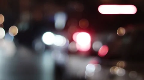 0197 Traffic. Defocused car lights,at a crossroad in town Stock Footage 33643841
