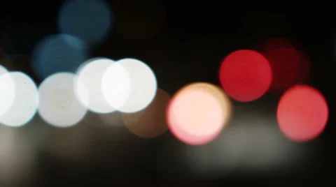 0198 Traffic. Defocused car lights,at a crossroad in town Stock Footage 33643624