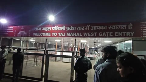 02-29-24, Agra, Visitors Approaching the West Gate of the Taj Mahal Stock Footage 266306482